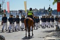 Royal Guards with police escort in Stockholm, Sweden