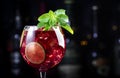 Royal lemonade alcoholic cocktail drink with tequila, dry gin, white rum, vodka, liquor, lime, raspberries and ice in wine glass. Royalty Free Stock Photo