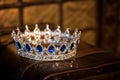 Royal luxury gold crown with sapphire. Success symbol