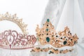 Royal luxury gold and silver crowns decorated with precious stones. Diamond tiaras with gemstones for prom and wedding