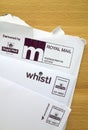 Royal Mail Postage Paid and Delivery Envelopes on a Desk Top