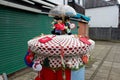 Royal Mail postbox decorated with knitted figures for Christmas holiday