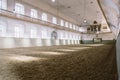 Royal manege with sand for horses in Denmark Copenhagen in territory Christiansborg Slot. Riding hall with sandy covering. Indoor