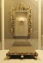 Royal mirror with gold frame in luxury interior