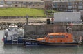 Royal National Lifebout Institute (RNLI) boat moored in a harbour