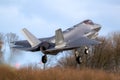 Royal Netherlands Air Force Lockheed Martin F-35A Lightning II fighter jet arriving at Leeuwarden Air Base, The Netherlands - Royalty Free Stock Photo