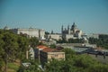 Royal Palace and Almudena Cathedral with buildings among trees in Madrid Royalty Free Stock Photo