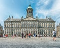 Royal Palace on the Dam Square in the summer, people on the streets shopping, bijenkorf, new church