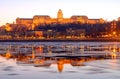 The Royal Palace at sunset over the icy Danube River, Budapest, Royalty Free Stock Photo