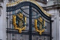 The Royal Seal. Close up of gate at Buckingham Palace London. Royalty Free Stock Photo