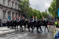 Royal soldiers on horseback during a morning changing of guard in central London