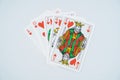 Royal straight flush playing cards poker hand in hearts isolated on white background Royalty Free Stock Photo