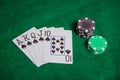 Royal Straight Flush with poker chip stacks