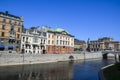 Royal Swedish Opera house of Stockholm with nearby business establishments near the river and bridge Royalty Free Stock Photo