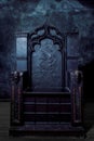 Royal throne. dark Gothic throne, front view Royalty Free Stock Photo