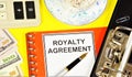 Royalty agreement. Text label on the planning folder. Royalty Free Stock Photo