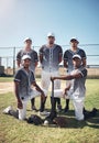 The royalty of baseball. Portrait of a group of confident young men playing a game of baseball. Royalty Free Stock Photo