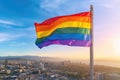 A royalty-free gay rainbow flag is waving against blue sky - Generative AI