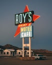 Roys Motel & Cafe neon sign at night, on Route 66 in the Mojave Desert of California