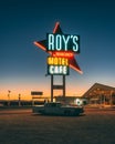 Roys Motel & Cafe neon sign at night, on Route 66 in the Mojave Desert of California Royalty Free Stock Photo
