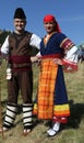 People in traditional folk costume of famous Rozhen folklore festival in Bulgaria Royalty Free Stock Photo