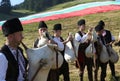 Rhodope bagpipers playing tunes on a Rozhen folklore festival in Bulgaria Royalty Free Stock Photo