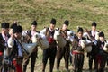 Rhodope bagpipers playing tunes on a Rozhen folklore festival in Bulgaria Royalty Free Stock Photo