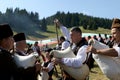 Rhodope bagpipers playing tunes on a Rozhen folklore festival in Bulgaria Royalty Free Stock Photo