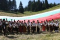 Rhodope bagpipers playing tunes on a Rozhen folklore festival in Bulgaria Royalty Free Stock Photo