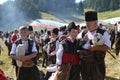 Rhodope bagpipers playing tunes on a Rozhen folklore festival in Bulgaria Royalty Free Stock Photo