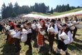 Rhodope bagpipers playing tunes on a Rozhen folklore festival in Bulgaria Royalty Free Stock Photo