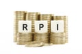 RPI (Retail Price Index) on Coin Stacks Isolated White Backgroun