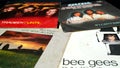 45 rpm covers of the BEE GEES group. composed of the brothers Barry, Robin and Maurice Gibb, the most successful artists in the hi