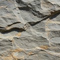 rregular rock surface featuring prominent layers and lines. The texture is rough, with Royalty Free Stock Photo