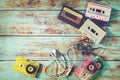 rretro tape cassette with earphone on wood table Royalty Free Stock Photo