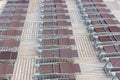 Rrows of brown deck chairs closed on cruise ship Royalty Free Stock Photo