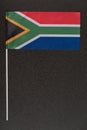 RSA flag on black background. National symbols of Republic of South Africa. Vertical frame