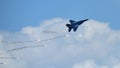 RSAF F-15SG figher jet performing aerobatics at Singapore Airshow Royalty Free Stock Photo