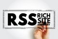 RSS Rich Site Summary - web feed that allows users and applications to access updates to websites in a standardized, computer- Royalty Free Stock Photo