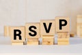 RSVP word made with building blocks isolated on white