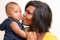 Happy mother kissing her baby Royalty Free Stock Photo