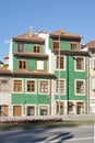 Rua de Dom Manuel II, Porto, Portugal,  traditional residential building with wooden window frames and green painted ceramic tiles Royalty Free Stock Photo