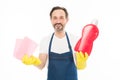 Rub to shine. Everything should be perfect. Cleaning service and household duty. Man in rubber gloves hold bottle liquid