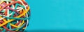 Rubber band ball on blue background Royalty Free Stock Photo