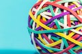 Rubber band ball on blue background Royalty Free Stock Photo