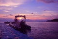 Rubber boat or dinghy dock on the floating pier early morning beautiful sunrise Royalty Free Stock Photo