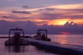 Rubber boat or dinghy dock on the floating pier early morning beautiful sunrise Royalty Free Stock Photo