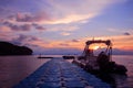 Rubber boat or dinghy dock on the floating pier early morning beautiful sunrise Royalty Free Stock Photo