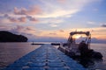 Rubber boat or dinghy dock on the floating pier early morning beautiful sunrise Royalty Free Stock Photo