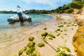 Rubber boat moored in a small cove in Sardinia Royalty Free Stock Photo